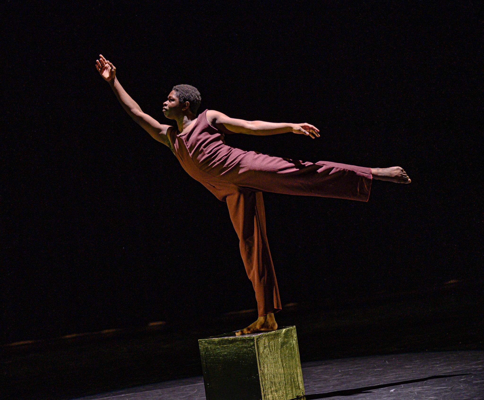 A Coker student performing on stage solo